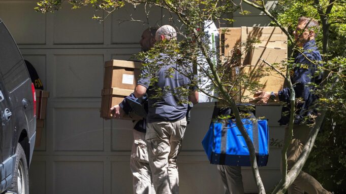 fbi-seizing-boxes-john-bolton-home-raid.jpg