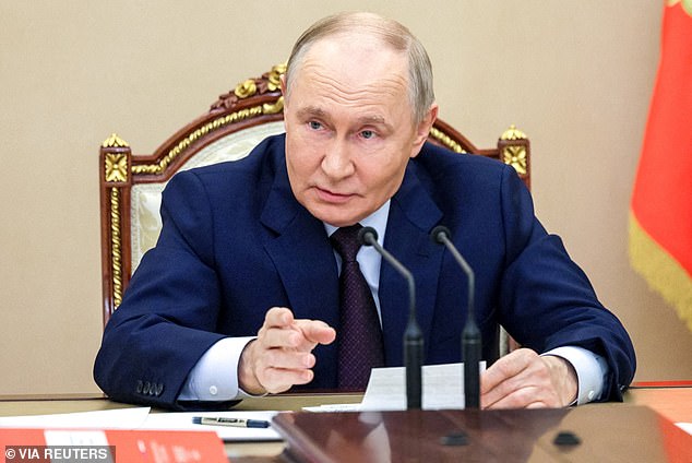 103619903-15261751-Russian_despot_Vladimir_Putin_pictured_has_warned_that_Russia_wi-a-309_1762360074826.jpg