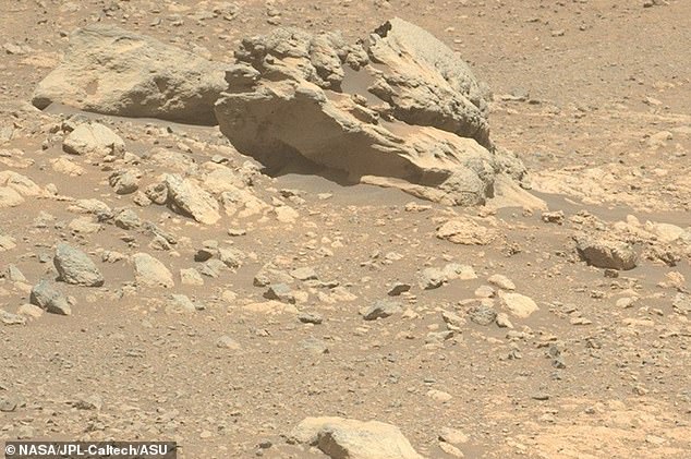 104002711-15305229-NASA_scientists_have_spotted_a_mysterious_rock_on_Mars_which_sho-a-198_1763558422838.jpg