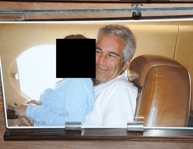 105004587-15412271-Jeffrey_Epstein_is_pictured_with_an_unnamed_girl_The_image_was_r-a-7_1766603822286.jpg