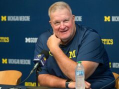 Técnico interino Poggi: Michigan é uma ‘organização com defeito’