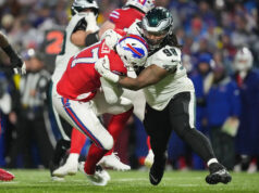 Os Eagles frustraram os Bills, interrompendo um dramático rali tardio com uma parada de conversão de 2 pontos, permitindo aos Patriots conquistar a AFC East.