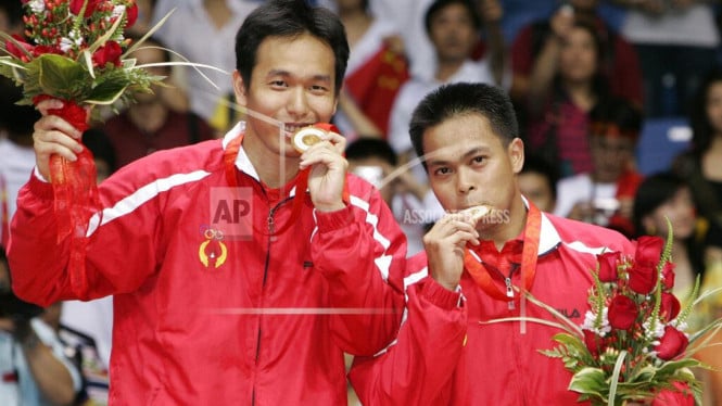 66ab7fa4d4b01-markis-kido-hendra-setiawan-juara-olimpiade-beijing-2008_665_374.jpg