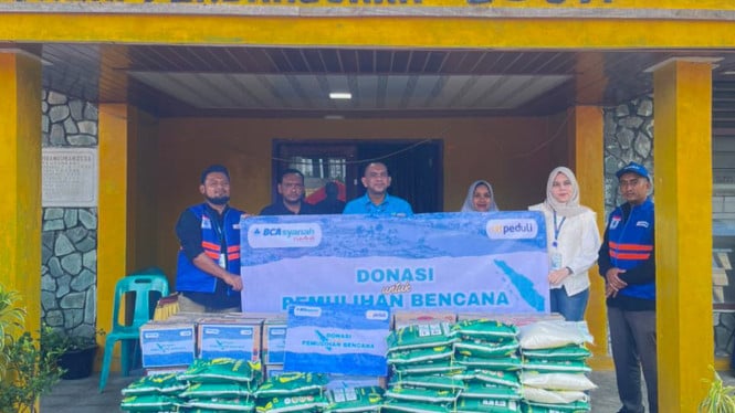 69448c3367e7e-bca-syariah-menyerahkan-donasi-di-aceh_665_374.jpg