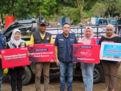 Levantando-se juntos após o desastre de Sumatra, Telkomsel distribui ajuda e postos de serviço em Padang