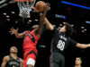 Porter e Clowney lideraram os Nets na vitória por 96-81 sobre os Raptors
