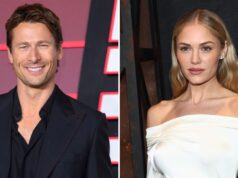 Glenn Powell e Michelle Randolph combinam de branco durante um raro passeio