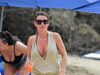 Coleen Rooney chega à praia em Barbados, mas é seu filho mais velho, Kai, de 16 anos, quem rouba a cena enquanto compete com o amigo de Wayne no Man United