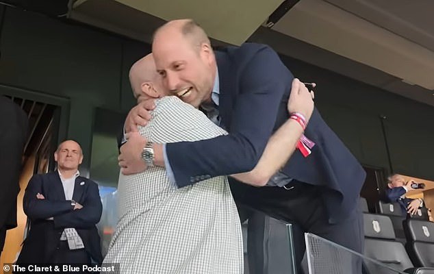 108789207-15839079-Prince_William_enthusiastically_hugged_a_fellow_Villa_fan_after_-m-28_1779402582804.jpg