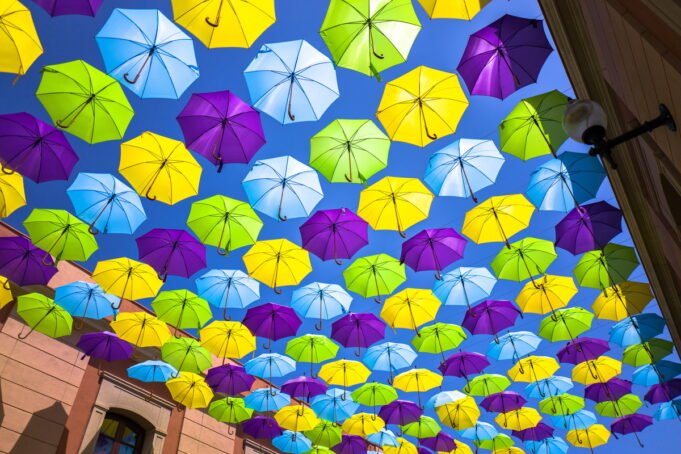 Colorful-Umbrellas-Covering-Street-NBS.jpg