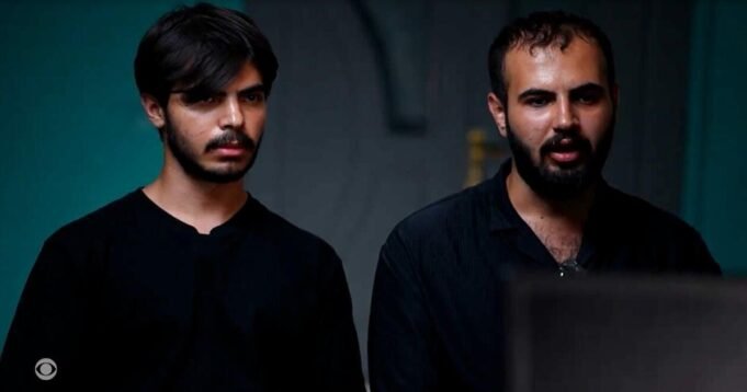 iran-brothers-protesters.jpg
