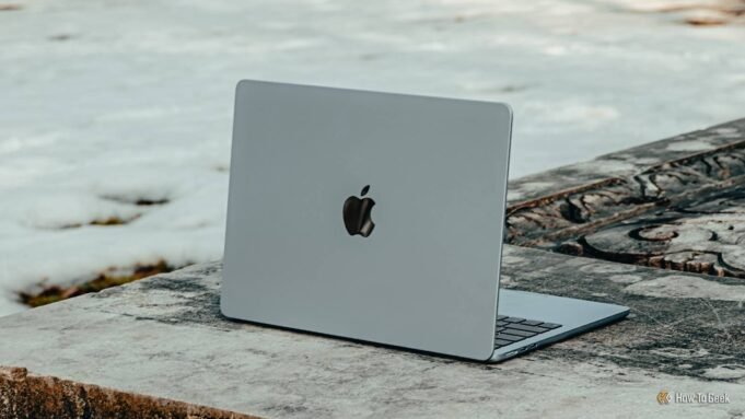 m4-macbook-air-in-sky-blue-from-an-angle-on-concrete-bench.jpg