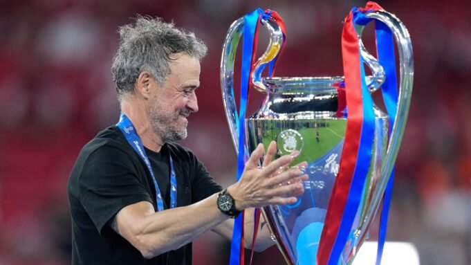 psg-manager-luis-enqirue-champions-league-trophy.jpg